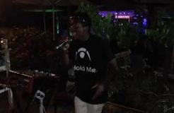 Alfa Jensle singing WIZKID